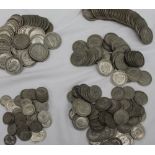 A large collection of white metal coins, dating from 1920-1946, including florins, half crowns,