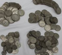 A large collection of white metal coins, dating from 1920-1946, including florins, half crowns,