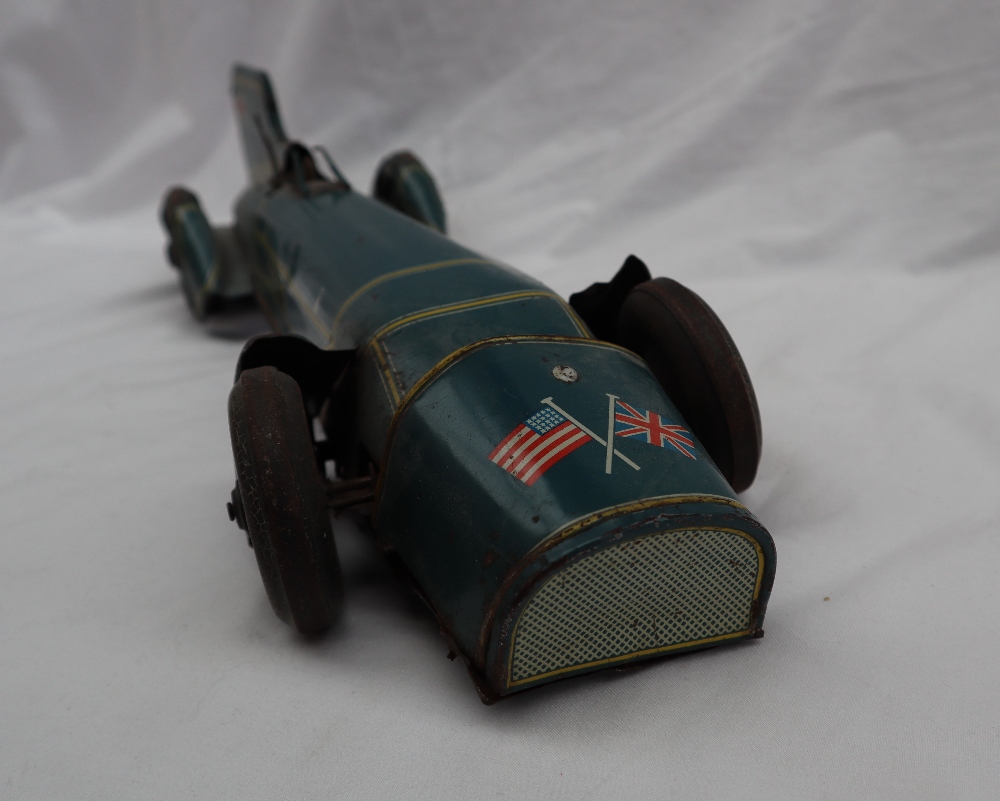 A tin-plate clockwork toy of Captain Malcolm Campbell's 'Blue Bird' Land Speed Record car by - Bild 8 aus 10