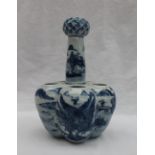 A Chinese blue and white porcelain tulip vase, with a central vase and five further apertures,