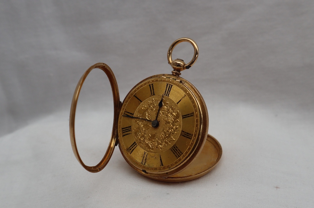 A George V 18ct yellow gold fob watch, the gold dial with Roman numerals and leaf decoration,