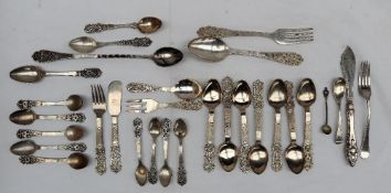 A collection of Mexican white metal flatwares, including spoons, forks etc, some marked 900,