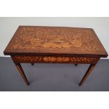 A 19th century Dutch marquetry games table,