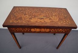 A 19th century Dutch marquetry games table,
