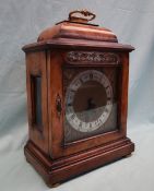 A 20th century walnut cased bracket clock in the George III style,