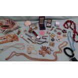 Assorted costume jewellery including brooches, Seiko wristwatches, earrings, beaded necklaces,