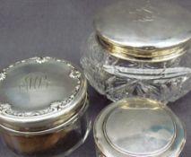 Three silver topped and glass dressing table pots, all marked Sterling,