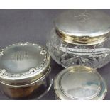 Three silver topped and glass dressing table pots, all marked Sterling,