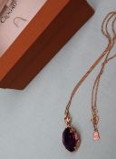 A Clogau 9ct yellow gold amethyst set pendant on a 9ct gold chain,