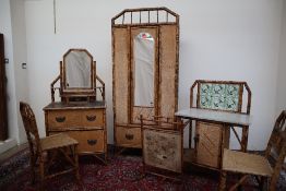 A six piece cane and bamboo bedroom furniture suite, comprising a single wardrobe, dressing chest,