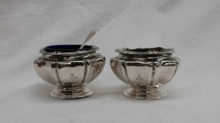 A pair of George V silver salts, of round lobed form to a spreading foot, Messrs Barnard, 1912,