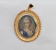 An 18ct yellow gold brooch / pendant with a head and shoulders portrait miniature inset,