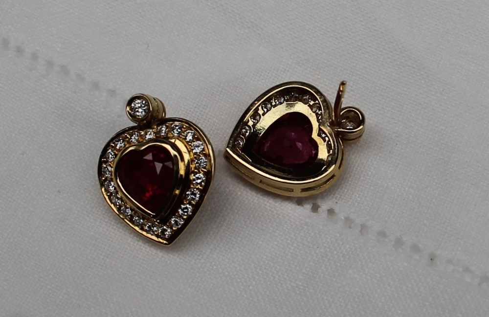 A pair of heart shaped ruby and diamond stud earrings, the central heart shaped ruby, - Image 4 of 4