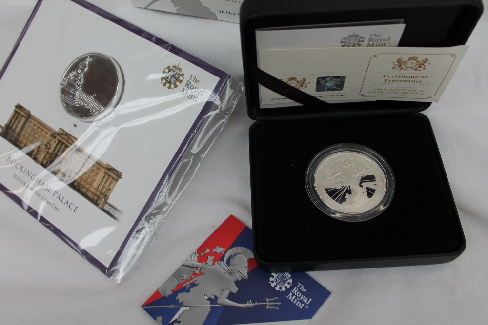 A Royal Mint 2015 UK £100 Buckingham Palace Fine silver coin,