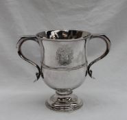 A George II two handled loving cup, of slight baluster form to a spreading foot,