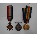 Three World War I medals including the British War Medal, Victory Medal and 1914 Star,