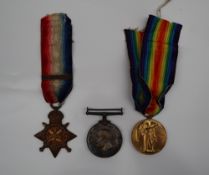 Three World War I medals including the British War Medal, Victory Medal and 1914 Star,