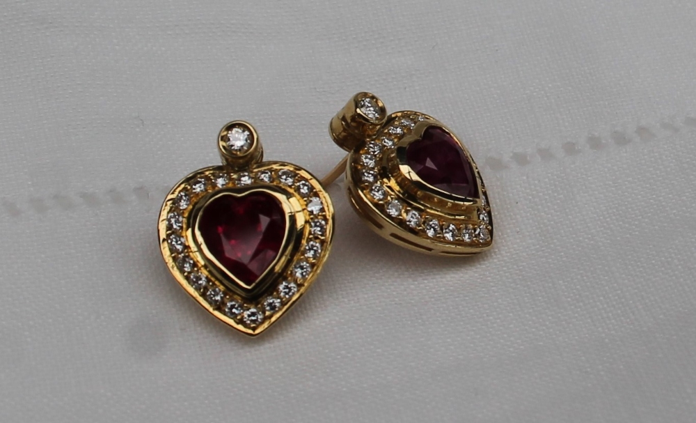 A pair of heart shaped ruby and diamond stud earrings, the central heart shaped ruby, - Image 2 of 4