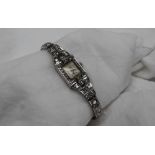 An Art Deco diamond set cocktail watch,