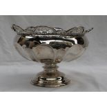 A George V silver pedestal bowl with a pierced rim and panelled body on a ring turned column