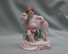 A Meissen porcelain figure of a child and a lamb, underglaze blue crossed swords mark to the base,