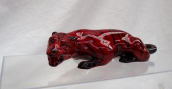 A Charles Noke for Royal Doulton Flambe model of a tiger,
