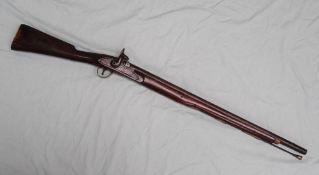 A 19th century 1863 pattern percussion cap rifle with a steel barrel and ramrod the lock plate