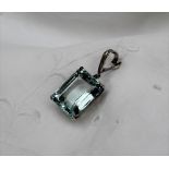 An aquamarine pendant, the emerald cut stone measuring approximately 20mm x 16mm,