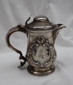 A George III silver tankard with a domed cover,