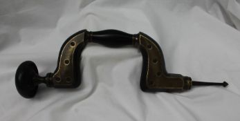 A brass framed ebony brace stamped "Henry Pasley's own manufacture The Ne Plus Ultra framed brace,