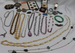 Assorted costume jewellery, including an Accurist wristwatch, tigers eye bracelet, brooches,