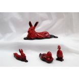 A Charles Noke for Royal Doulton model of a Hare, 19cm long, together with a smaller example,