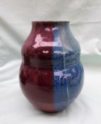 A Diane Love for Ruth Stein studio art pottery vase, decorated in blues and purple,