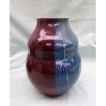 A Diane Love for Ruth Stein studio art pottery vase, decorated in blues and purple,