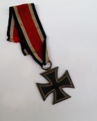 A WWII German Third Reich Iron Cross 2nd Class Medal, 1939 and swastika to fascia, 1813 to verso,