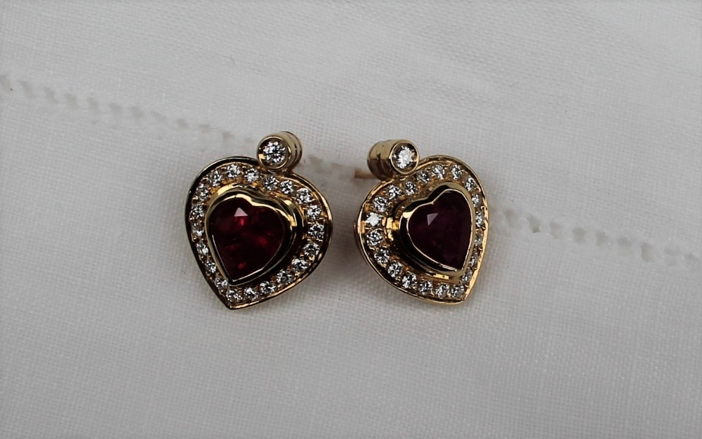 A pair of heart shaped ruby and diamond stud earrings, the central heart shaped ruby, - Image 3 of 4