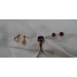 A 9ct yellow gold amethyst set dress ring together with a pair of amethyst earrings and a pair of