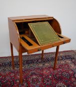 An Edwardian satinwood bureau with cylinder tambour and pull out writing surface fitted with