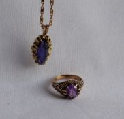 A 9ct yellow gold dress ring, with a single round faceted amethyst, size N,