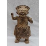 A pre-Columbian type figure of a "Smiling" figure or Sonrientes, nude from the waist up,