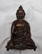 A bronze figure of a seated buddha, probably Burmese,