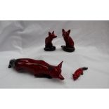 A large Charles Noke for Royal Doulton flambe stalking fox, printed marks, 32cm long,