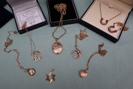 Assorted 9ct yellow gold necklaces some set with pendants, locket etc,