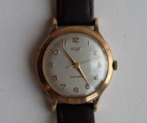 A Gentleman's 9ct yellow gold Tissot automatic wristwatch,