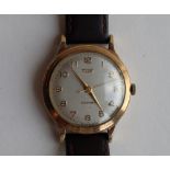 A Gentleman's 9ct yellow gold Tissot automatic wristwatch,