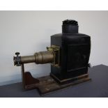 A japanned tin and brass magic Lantern,