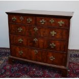 A George I walnut chest,