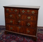 A George I walnut chest,