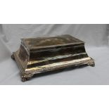 A large white metal table top cigarette box,
