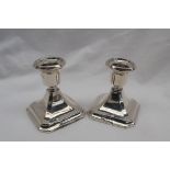 A pair of George VI silver desk candlesticks, of square tapering form, Birmingham, 1939,